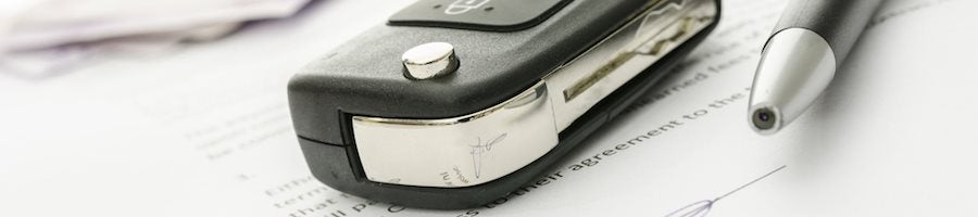 Used Car Keys on Paperwork