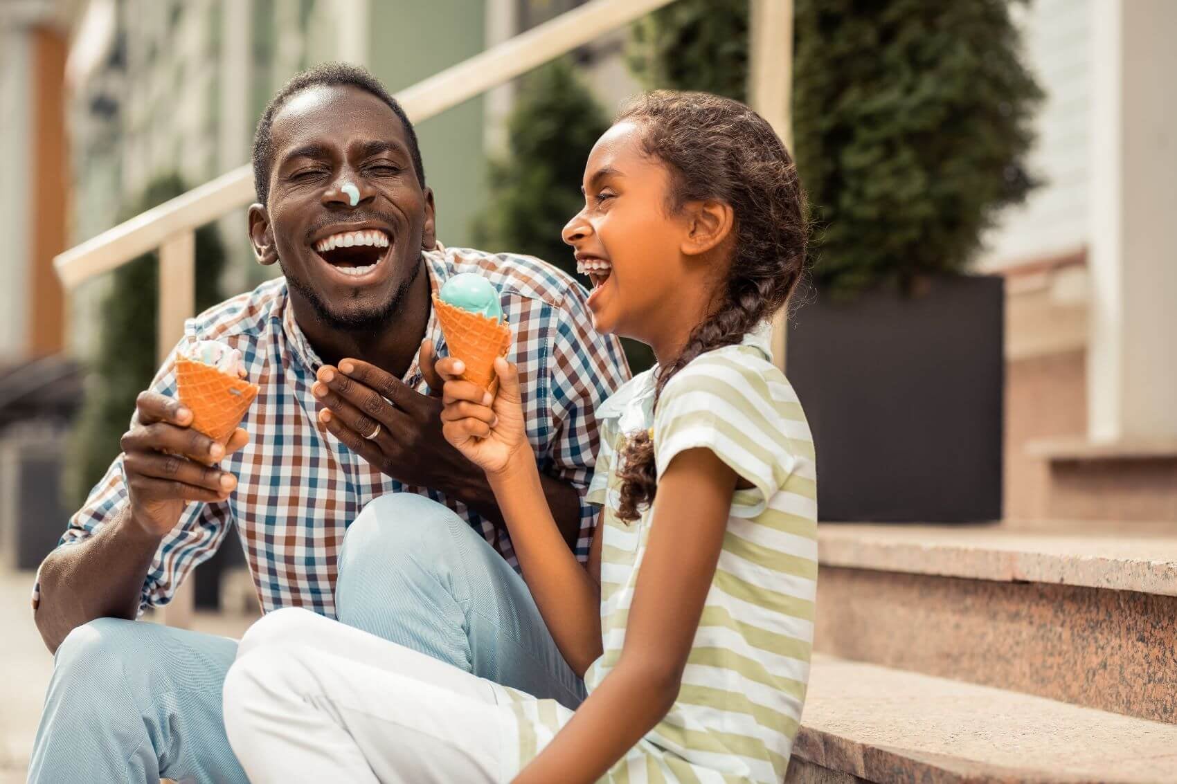Dad and Daughter Enjoying Ice Cream